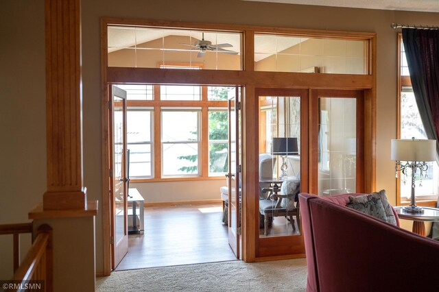 14578 Hunters Ln, Savage, MN 55378 - doorway featuring light carpet, a ceiling fan, and lofted ceiling