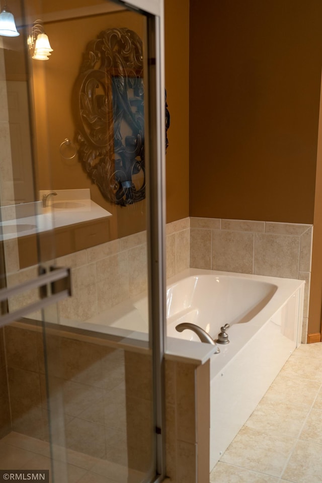 14578 Hunters Ln, Savage, MN 55378 - full bath with a garden tub, a stall shower, and tile patterned floors