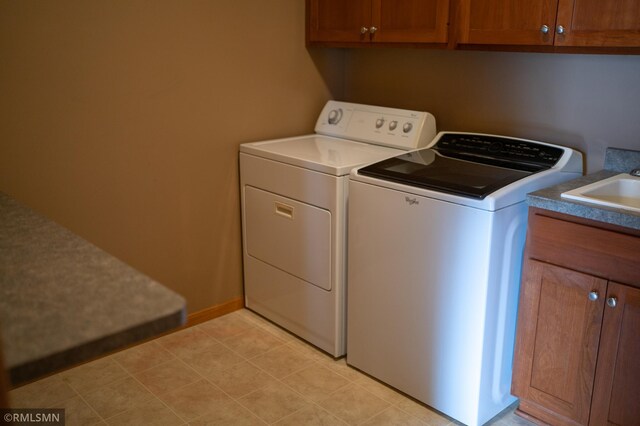 14578 Hunters Ln, Savage, MN 55378 - laundry area with independent washer and dryer and cabinet space