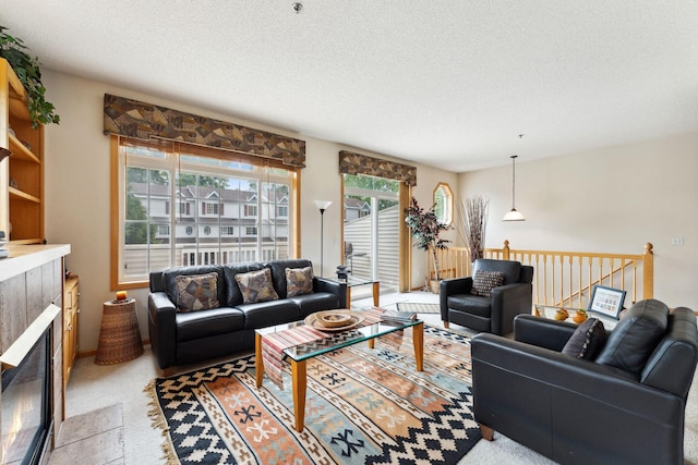 844 Coon Rapids Boulevard Extension NW, Coon Rapids, MN 55433 - living area with a textured ceiling and a tile fireplace