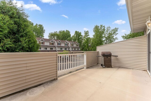 844 Coon Rapids Boulevard Extension NW, Coon Rapids, MN 55433 - view of patio / terrace with grilling area and a residential view