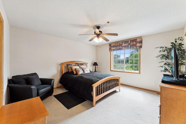 844 Coon Rapids Boulevard Extension NW, Coon Rapids, MN 55433 - carpeted bedroom featuring a textured ceiling and ceiling fan