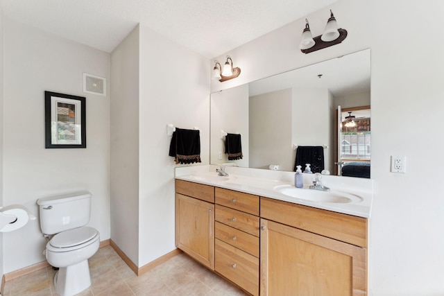 844 Coon Rapids Boulevard Extension NW, Coon Rapids, MN 55433 - bathroom with double vanity, tile patterned flooring, and ensuite bath