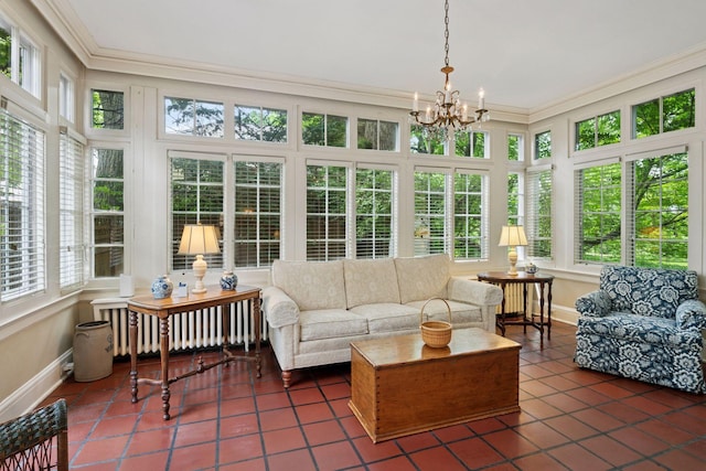 196 Mississippi River Blvd S, Saint Paul, MN 55105 - sunroom / solarium with ornamental molding, tile patterned flooring, a chandelier, and radiator heating unit