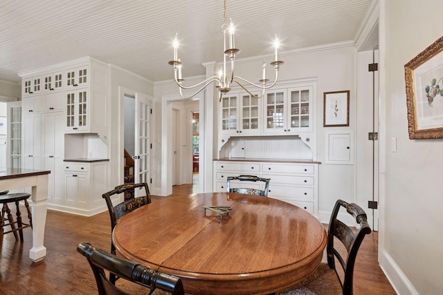 196 Mississippi River Blvd S, Saint Paul, MN 55105 - dining area featuring dark wood-style flooring, ornamental molding, and a chandelier