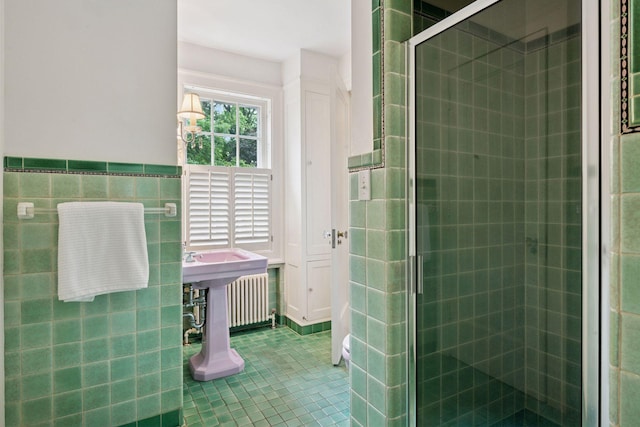 196 Mississippi River Blvd S, Saint Paul, MN 55105 - bathroom with tile walls, a stall shower, and tile patterned floors