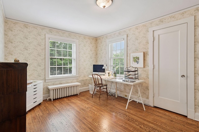 196 Mississippi River Blvd S, Saint Paul, MN 55105 - office with radiator heating unit, wood finished floors, wallpapered walls, and ornamental molding