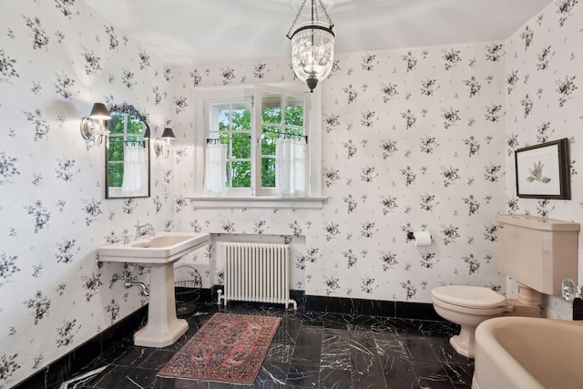 196 Mississippi River Blvd S, Saint Paul, MN 55105 - full bath with radiator, wallpapered walls, a tub to relax in, marble finish flooring, and a chandelier