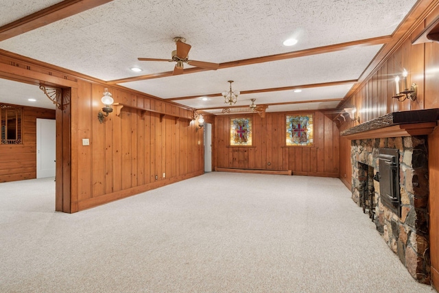 196 Mississippi River Blvd S, Saint Paul, MN 55105 - unfurnished living room featuring light carpet, a stone fireplace, wood walls, a ceiling fan, and beam ceiling