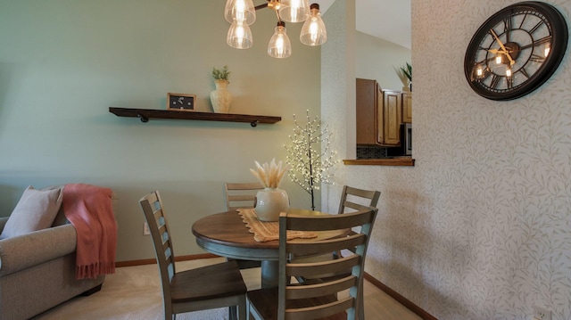 3504 Damon St Unit 38, Eau Claire, WI 54701 - dining area with a chandelier and wallpapered walls