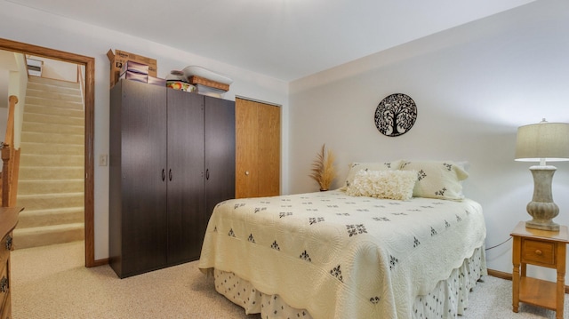 3504 Damon St Unit 38, Eau Claire, WI 54701 - bedroom with light carpet and two closets