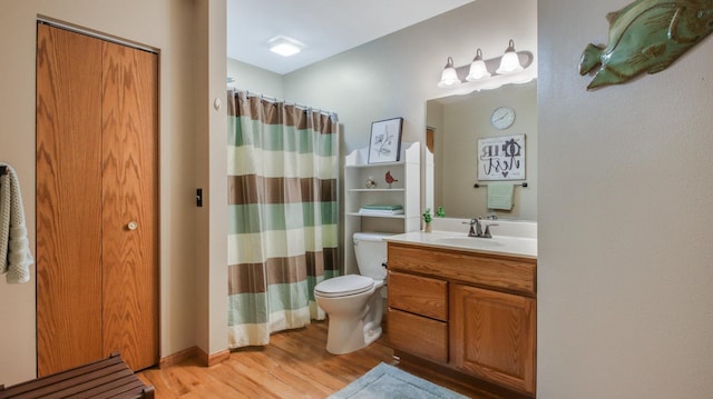 3504 Damon St Unit 38, Eau Claire, WI 54701 - full bath featuring wood finished floors, vanity, and a shower with shower curtain
