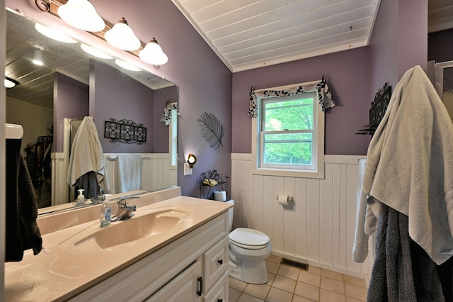 14102 Eau Claire Acres Cir, Gordon, WI 54838 - bathroom with a wainscoted wall, tile patterned floors, vanity, vaulted ceiling, and wooden ceiling