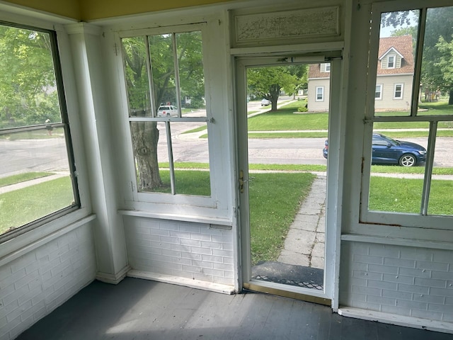 604 7th Ave E, Alexandria, MN 56308 - doorway with plenty of natural light and hardwood / wood-style floors