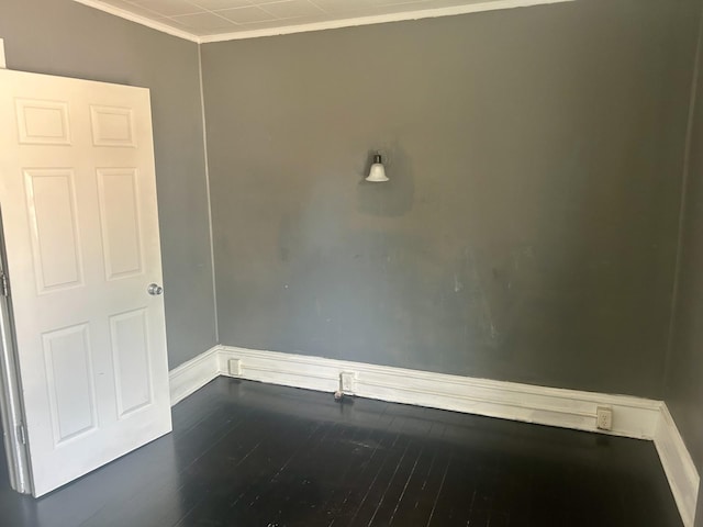604 7th Ave E, Alexandria, MN 56308 - spare room with ornamental molding and wood finished floors