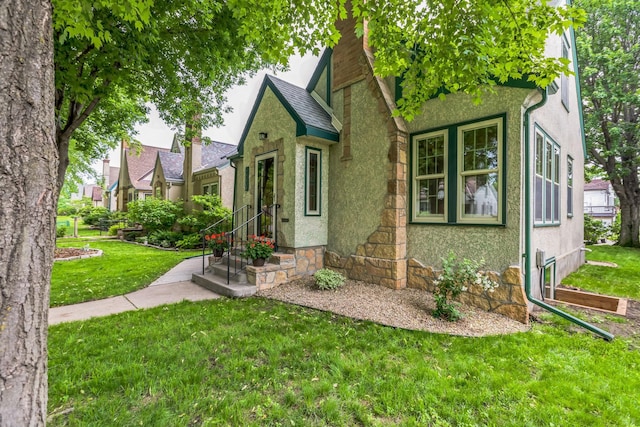 5223 15th Ave S, Minneapolis, MN 55417 - tudor home with a front lawn and stucco siding