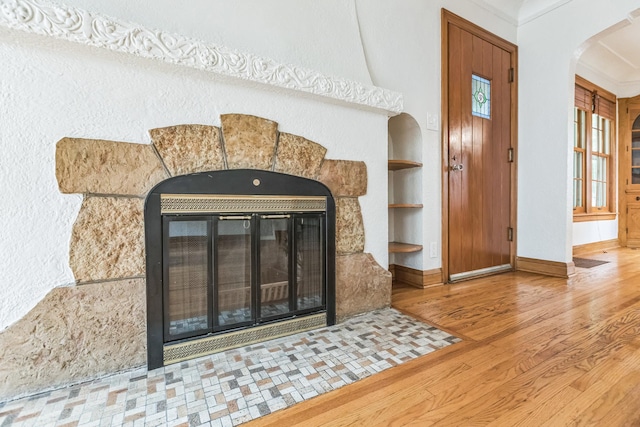 5223 15th Ave S, Minneapolis, MN 55417 - detailed view of a tile fireplace, arched walkways, and wood finished floors