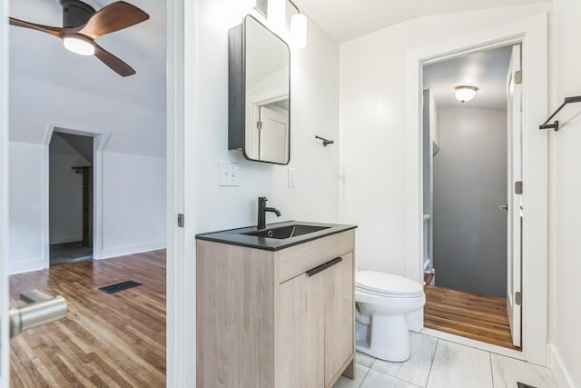 5223 15th Ave S, Minneapolis, MN 55417 - bathroom featuring vanity, a ceiling fan, and vaulted ceiling