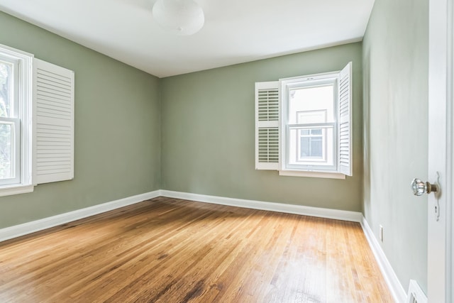 5223 15th Ave S, Minneapolis, MN 55417 - unfurnished room with wood finished floors and baseboards