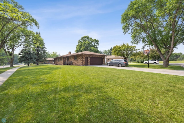 106 37th Ave S, Moorhead, MN 56560 - view of front of house featuring concrete driveway, an attached garage, a chimney, and a front lawn