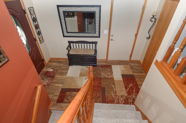 6441 Arthur St NE, Fridley, MN 55432 - foyer with stairway and wood finished floors