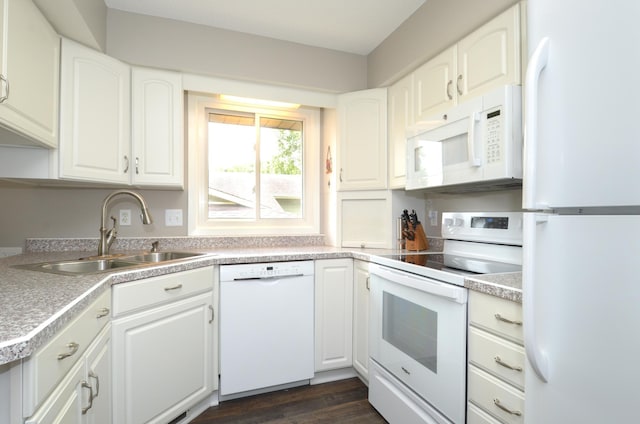 6441 Arthur St NE, Fridley, MN 55432 - kitchen featuring white appliances, white cabinetry, light countertops, and dark wood finished floors
