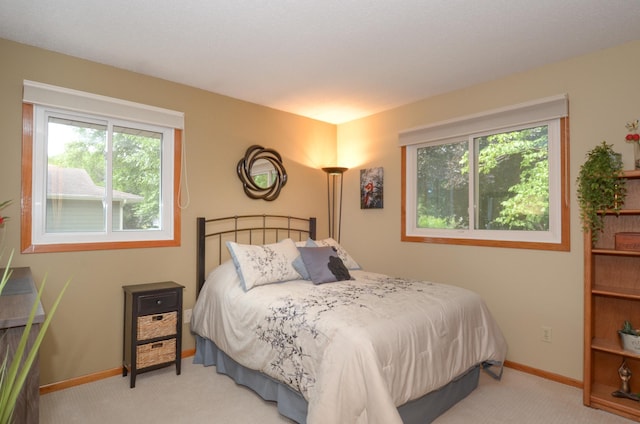6441 Arthur St NE, Fridley, MN 55432 - bedroom with carpet floors and multiple windows