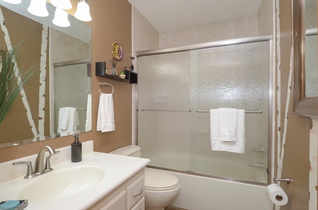 6441 Arthur St NE, Fridley, MN 55432 - bathroom with vanity and bath / shower combo with glass door