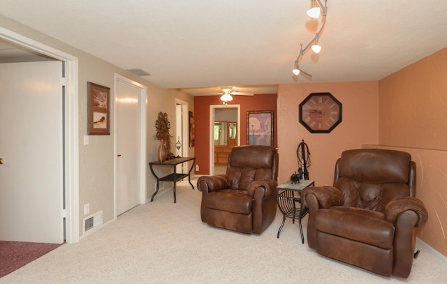 6441 Arthur St NE, Fridley, MN 55432 - sitting room with carpet floors and ceiling fan