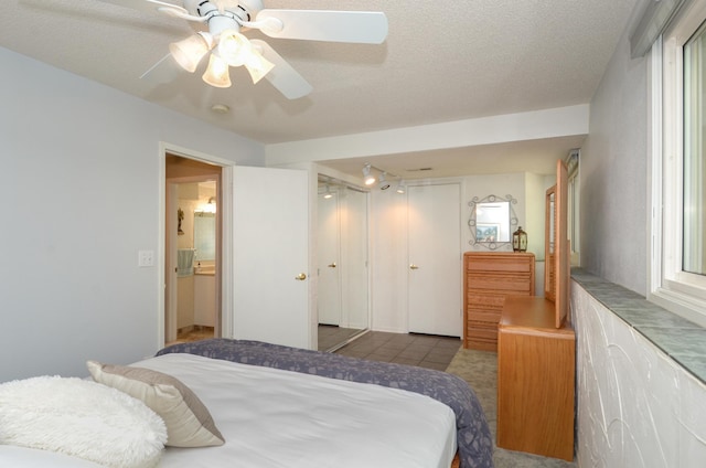 6441 Arthur St NE, Fridley, MN 55432 - tiled bedroom featuring a ceiling fan