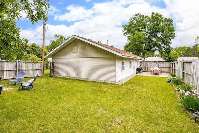 611 11th Ave, Grand Rapids, MN 55744 - fenced backyard featuring a patio