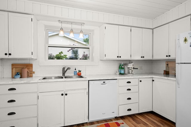 611 11th Ave, Grand Rapids, MN 55744 - kitchen featuring white appliances, decorative backsplash, white cabinets, dark wood-style floors, and decorative light fixtures