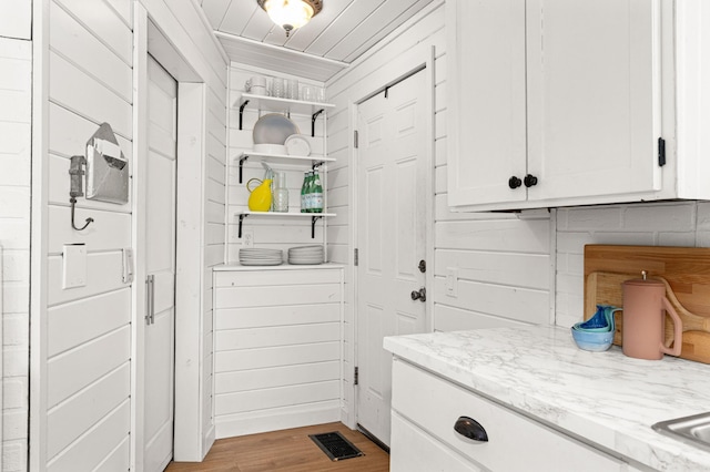611 11th Ave, Grand Rapids, MN 55744 - laundry area with light wood-style floors