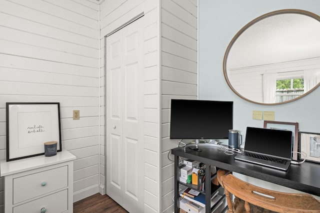 611 11th Ave, Grand Rapids, MN 55744 - home office featuring wooden walls and dark wood finished floors