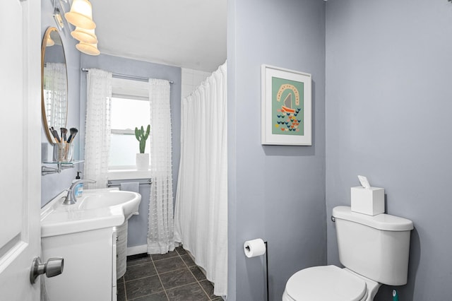 611 11th Ave, Grand Rapids, MN 55744 - bathroom with vanity, tile patterned floors, and a shower with shower curtain