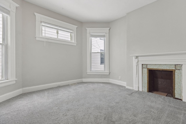 3208 Pleasant Ave, Minneapolis, MN 55408 - unfurnished living room with carpet floors and a premium fireplace