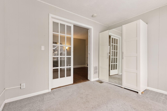 3208 Pleasant Ave, Minneapolis, MN 55408 - unfurnished room featuring carpet and a smoke detector