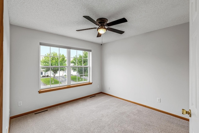 1587 Liberty St, Shakopee, MN 55379 - carpeted empty room with a ceiling fan and a textured ceiling