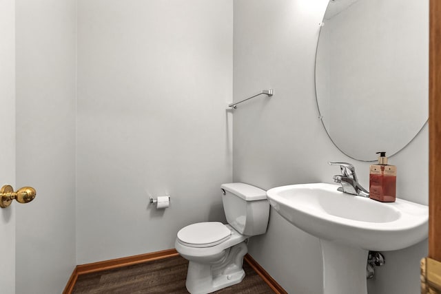 1587 Liberty St, Shakopee, MN 55379 - bathroom featuring toilet and wood finished floors