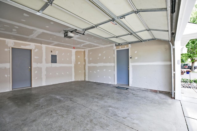 304 Tanager Path, Mankato, MN 56001 - garage featuring a garage door opener and electric panel