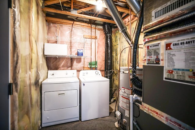 304 Tanager Path, Mankato, MN 56001 - laundry area with washing machine and dryer, gas water heater, and heating unit