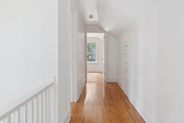 720 40th St, Minneapolis, MN 55409 - hallway featuring lofted ceiling and light wood-style floors