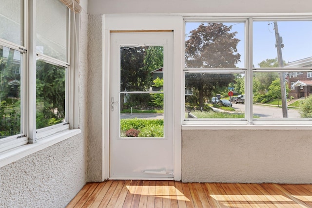 720 40th St, Minneapolis, MN 55409 - doorway featuring healthy amount of natural light and hardwood / wood-style flooring