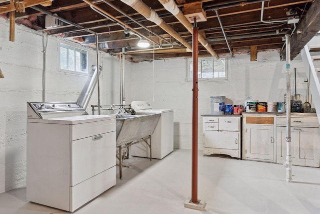 720 40th St, Minneapolis, MN 55409 - basement with independent washer and dryer and a sink