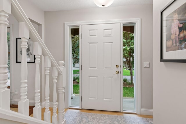 17233 Harrington Way, Lakeville, MN 55044 - entrance foyer featuring stairway and wood finished floors