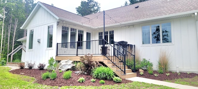 9029 Crown Hill Ct, Brainerd, MN 56401 - view of front of property featuring a shingled roof and board and batten siding