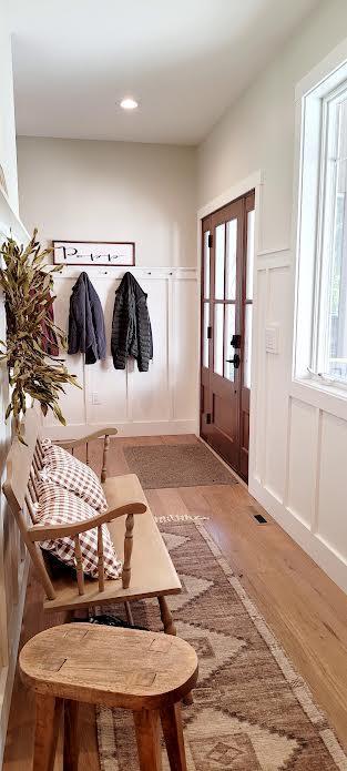 9029 Crown Hill Ct, Brainerd, MN 56401 - mudroom featuring a decorative wall, light wood-type flooring, a wainscoted wall, and recessed lighting