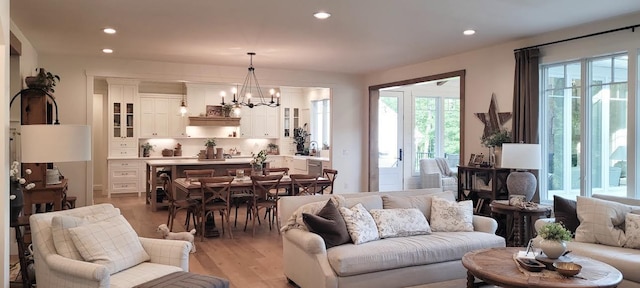 9029 Crown Hill Ct, Brainerd, MN 56401 - living area featuring healthy amount of natural light, light wood finished floors, recessed lighting, and a chandelier