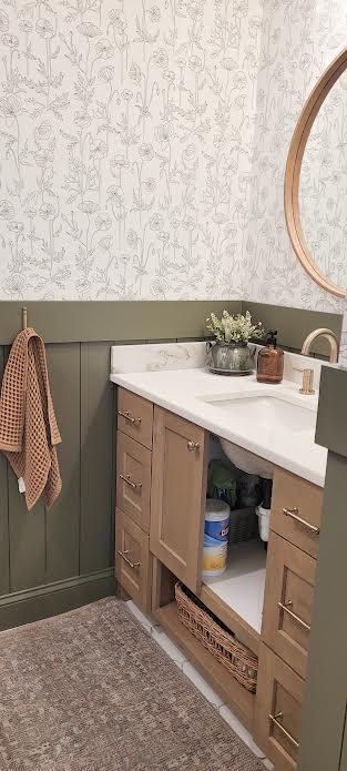 9029 Crown Hill Ct, Brainerd, MN 56401 - bathroom with wallpapered walls and vanity