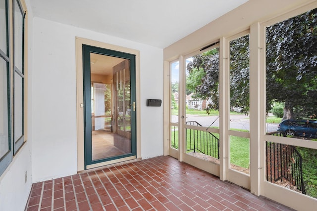 4300 Beard Ave S, Minneapolis, MN 55410 - unfurnished sunroom with brick floors